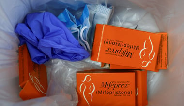 Used packages of Mifepristone, the first pill in a medical abortion, lie in the trash at Alamo Women's Clinic in Carbondale, Illinois