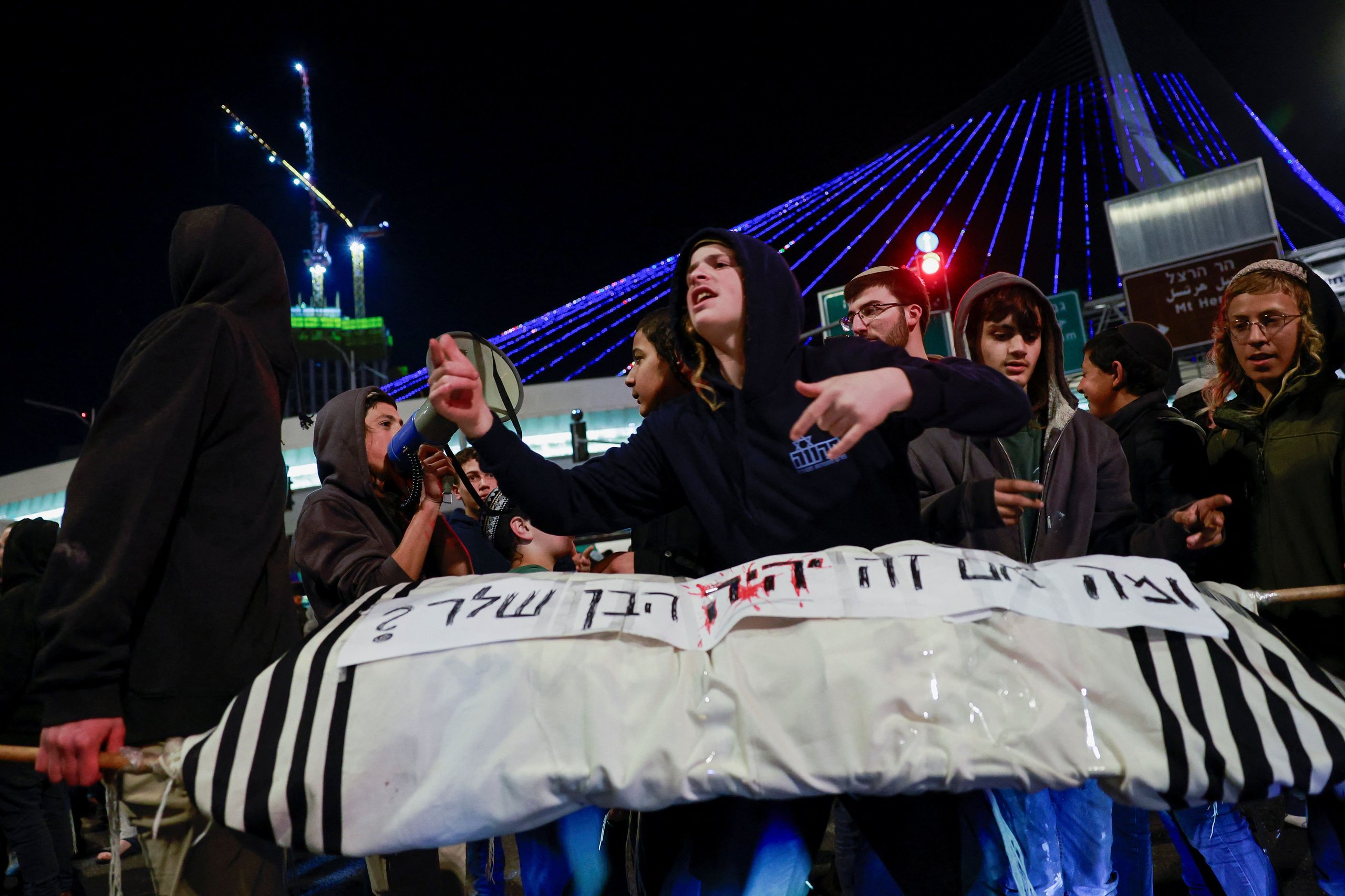 Israelis protest a ceasefire deal, in Jerusalem