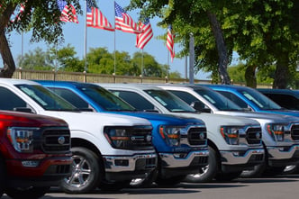 A row of new Ford F-150 trucks for sale at a Phoenix area new car dealership