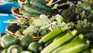 Arrangement of vegetable in wicker basket at market