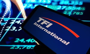 Konskie, Poland - December 14, 2024 TFI International company logo displayed on mobile phone. Photo by Shutterstockcom - Piotr Swat