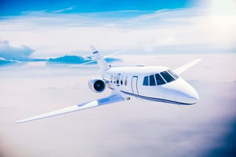 Luxury private jet soaring through the sky