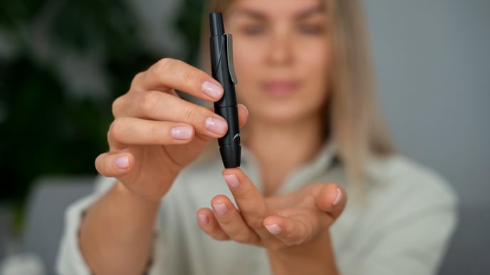 Medium shot diabetic woman checking her glucose level