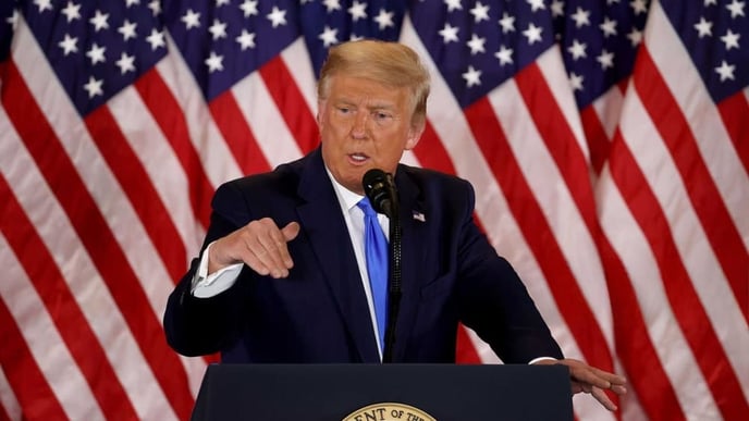 U.S. President Donald Trump speaks on election night in the East Room of the White House in the early morning hours of November 04, 2020 in Washington, DC