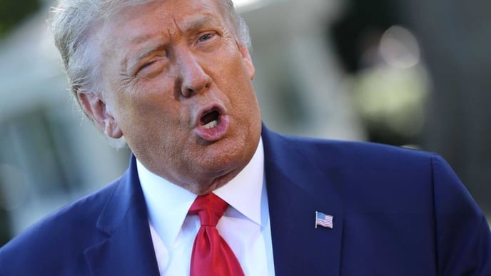 U.S. President Donald Trump talks to reporters as he departs the White House September 21, 2020 in Washington, DC