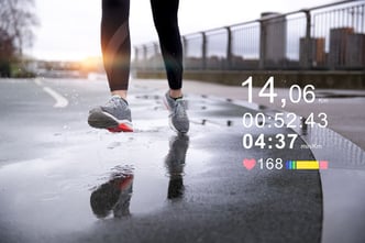 Woman running outdoors from the front, showcasing advanced statistics