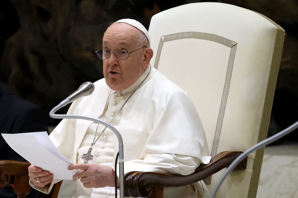 VATICAN CITY, VATICAN - 10 JANUARY 2024: Pope Francis reads during his weekly general audience in the Paul VI hall.