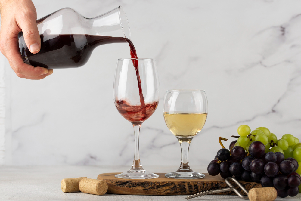 Red and white wine on table