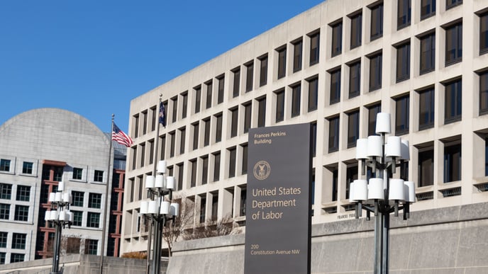 Sign on Constitution Avenue in-front of the US Department of Labor HQ at the Frances Perkins Building in D.C.