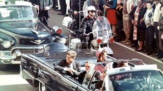 The Kennedys and the Connallys in the presidential limousine moments before the assassination in Dallas