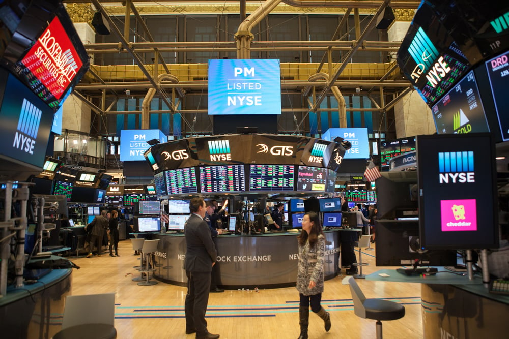 The NYSE American stock exchange located at 11 Wall Street, Lower Manhattan, New York City. In stock exchange billions of dollars of stocks are traded daily. By Shutterstock.com - orhan akkurt