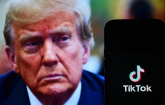 TikTok logo on smartphone screen and back silhouette US President Donald Trump. Tiktok is a social media platform originating from China. New York, USA. 10.12.2024