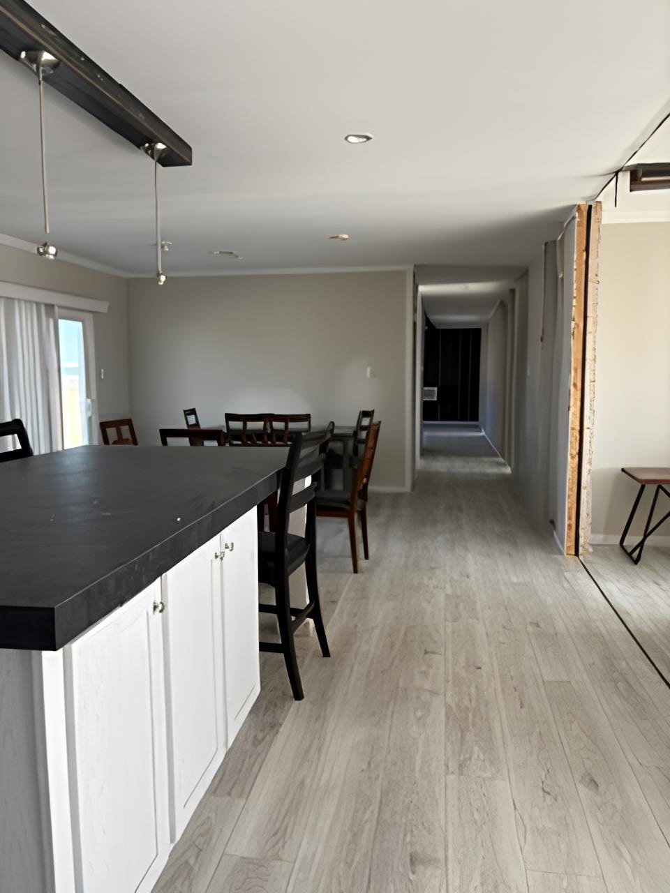Large kitchen island and dining area in used repo manufactured home