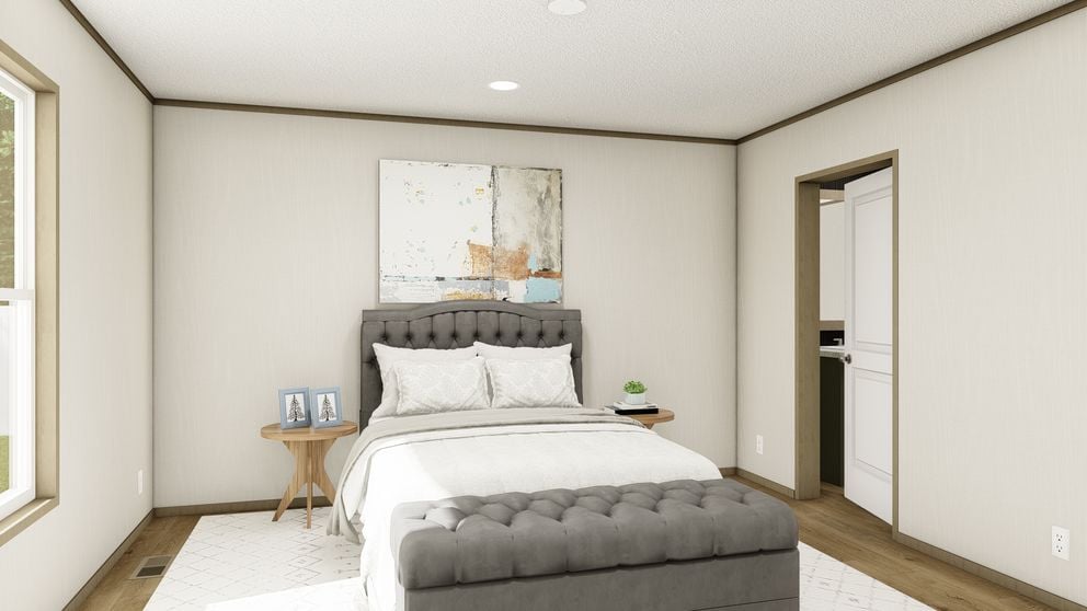 Primary bedroom inside the Clayton Epic Explorer manufactured home in Colorado