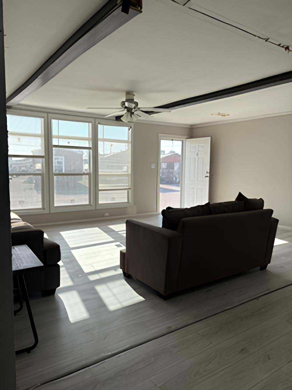 Bright doublewide living room with large front windows in Midland TX
