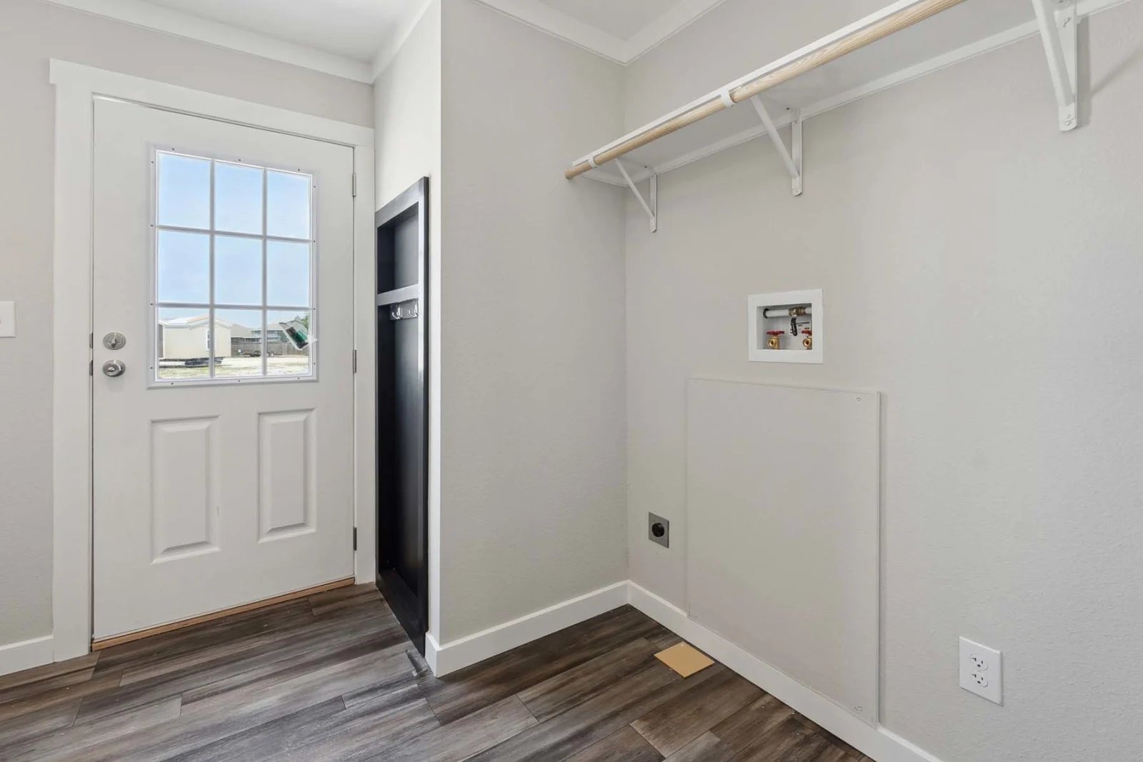 Laundry area in the Winter Series 32x56H by Champion Homes at Factory Mobile Homes Colorado