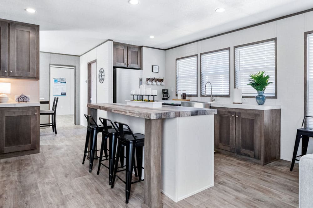 Breakfast bar and farmhouse sink in the Jessup Wilson kitchen