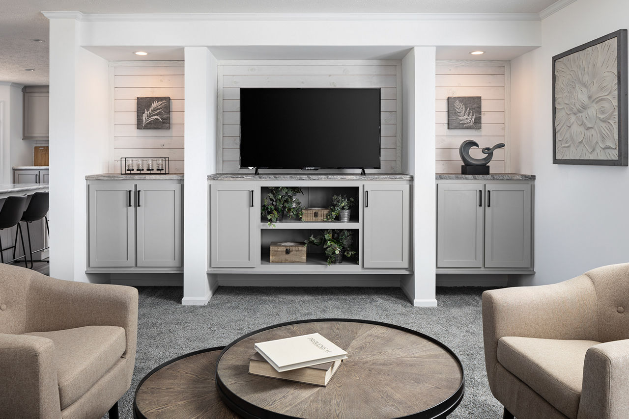 Built-in entertainment center in The Odyssey XL 3256 living area