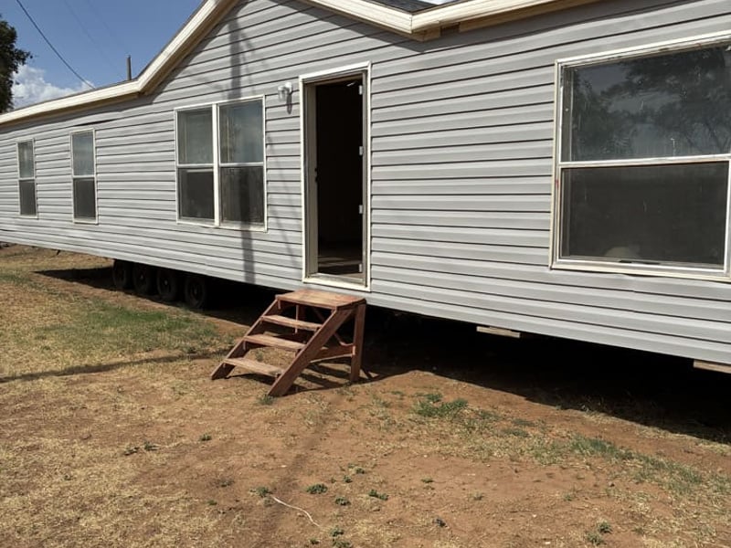 Used Bank Repo 32x56 #8678 for sale at Bell Mobile Homes in Levelland, TX