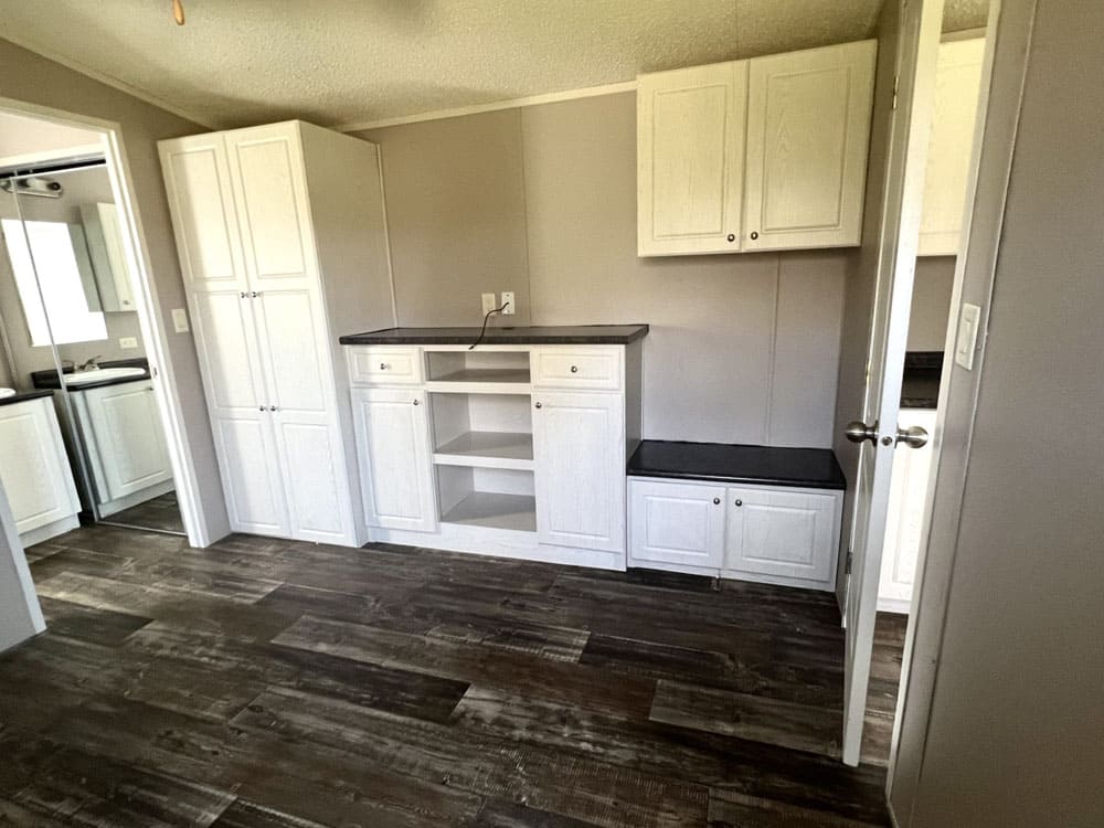 Built-in bedroom storage in the Tiny Hacienda 1234-11FLA home