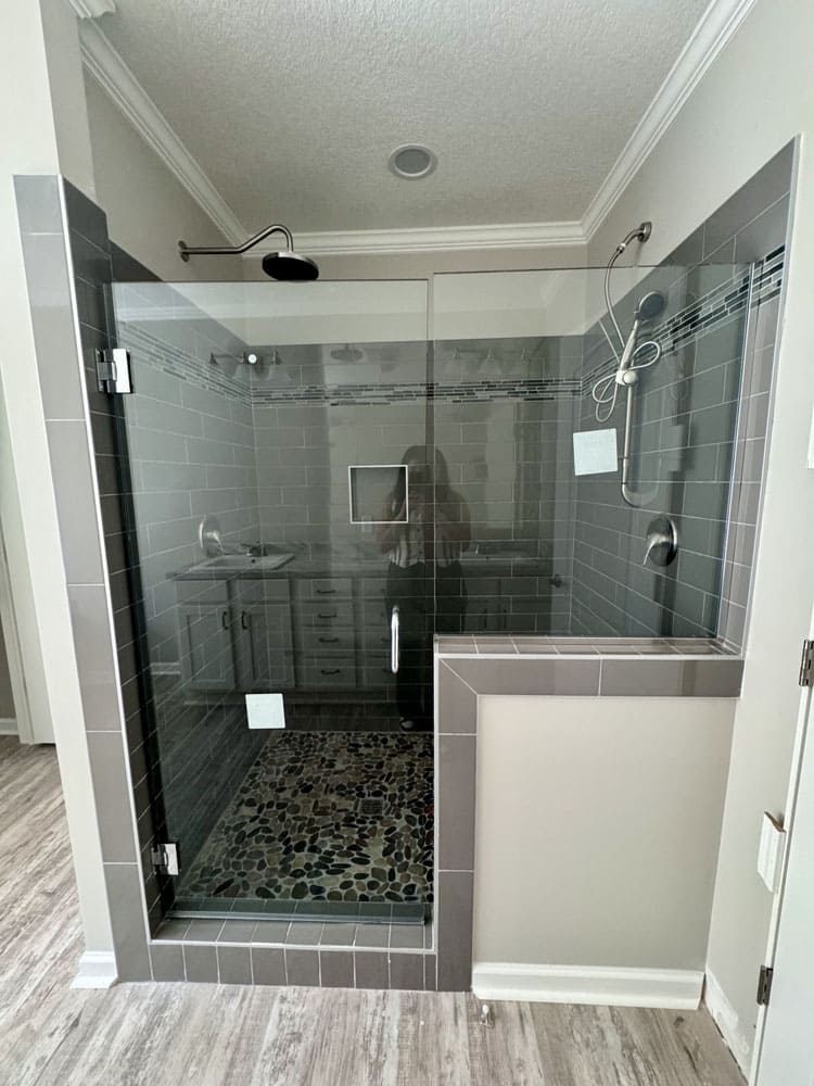 Luxury tiled walk-in shower in The Ace by Franklin Homes