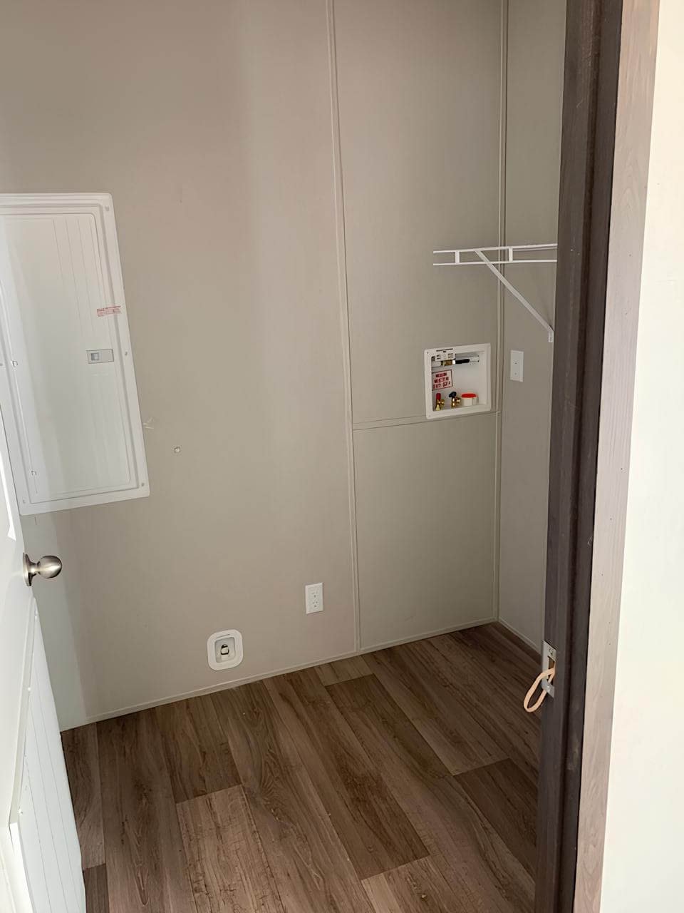 Laundry room in The Colossal Ultrawide three-bedroom home