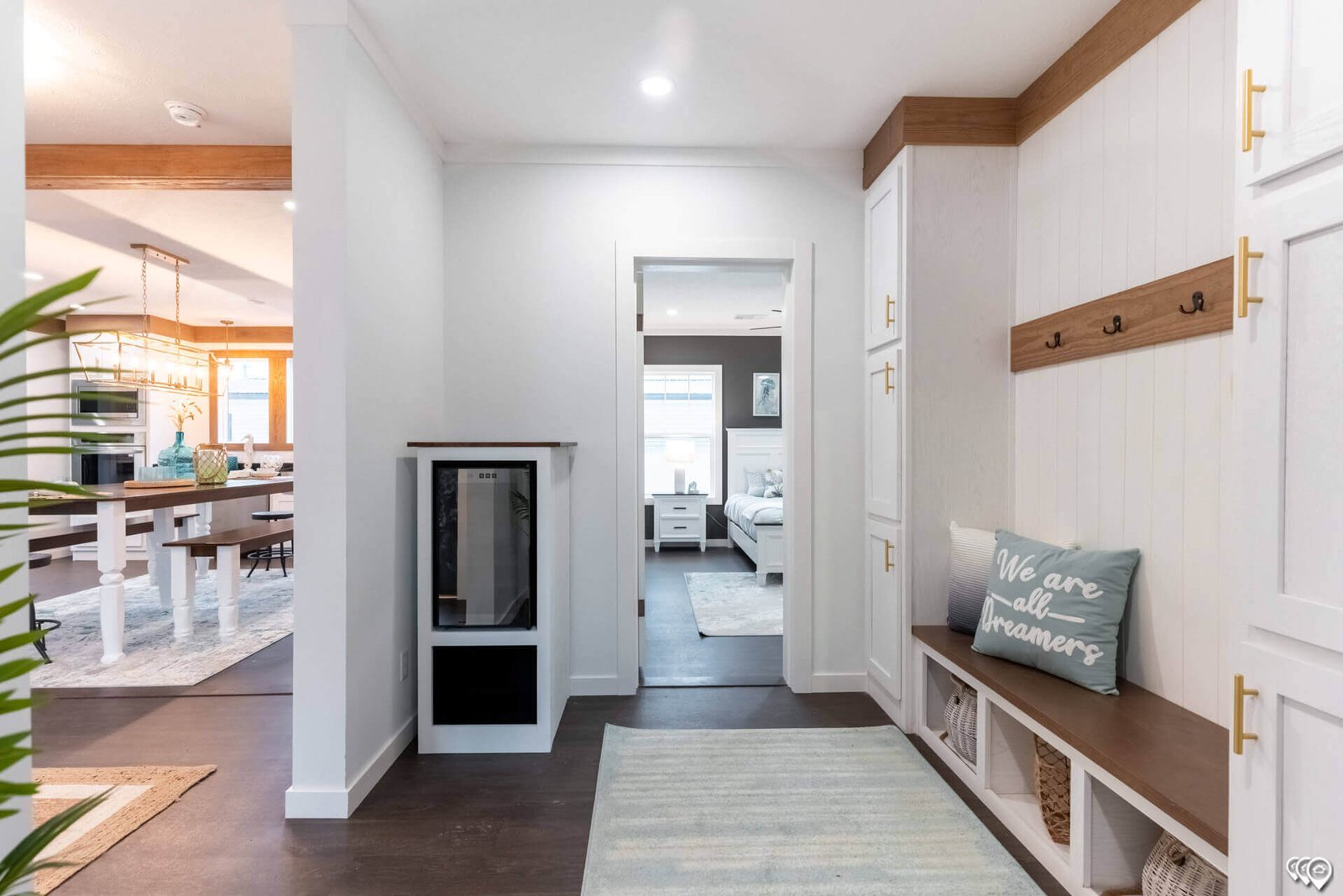Hallway drop zone with built-in bench and storage in The Trinity CS-3242