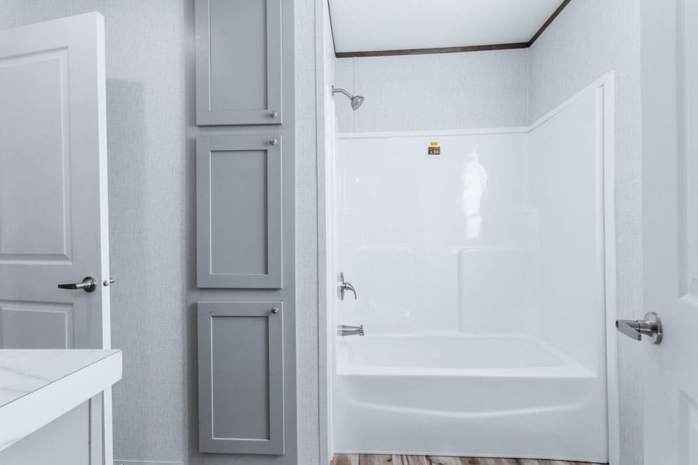 Tub and shower combination in The Murphy four-bedroom manufactured home
