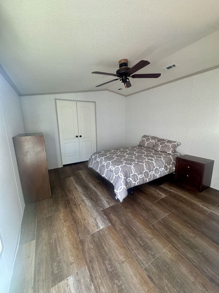 Large bedroom with double closet in a Legacy Housing singlewide