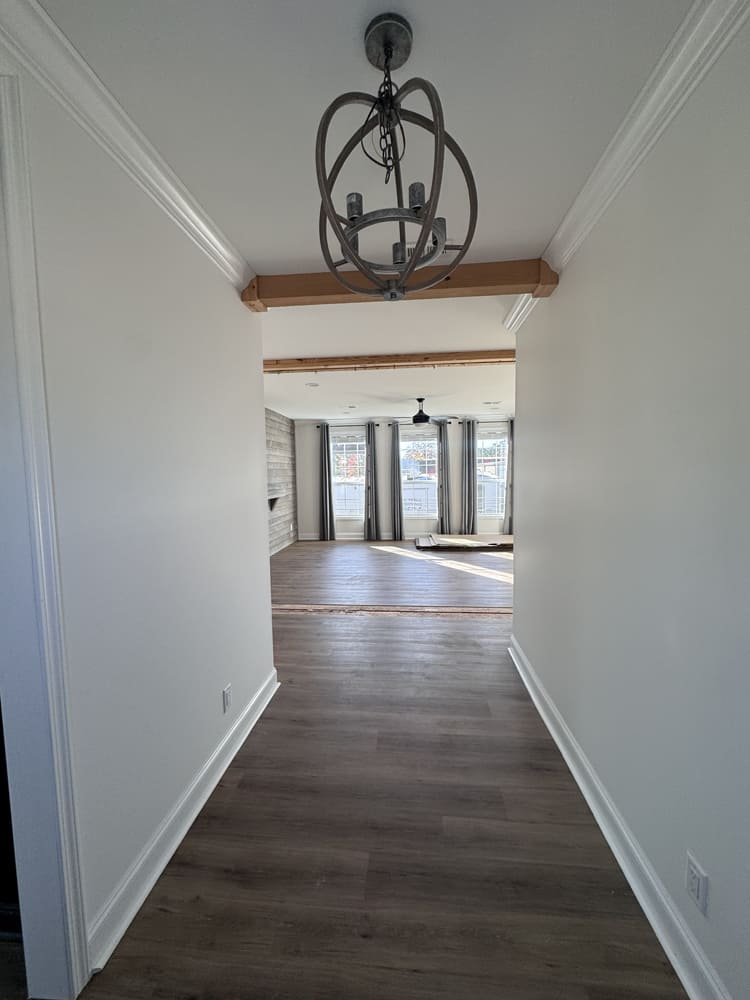 Entry hallway leading to the living room in The Shoreline by Franklin Homes