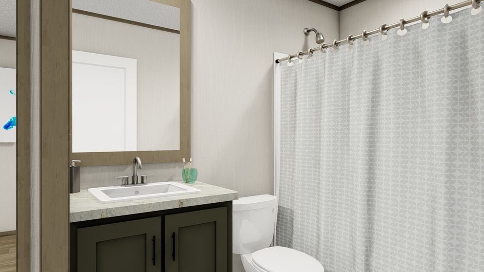Guest bathroom in the Clayton Epic Mariner at Factory Mobile Homes Colorado