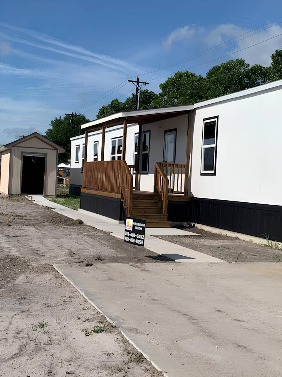 Covered front porch of The Cuatro at Los Caballos Mobile Home Park