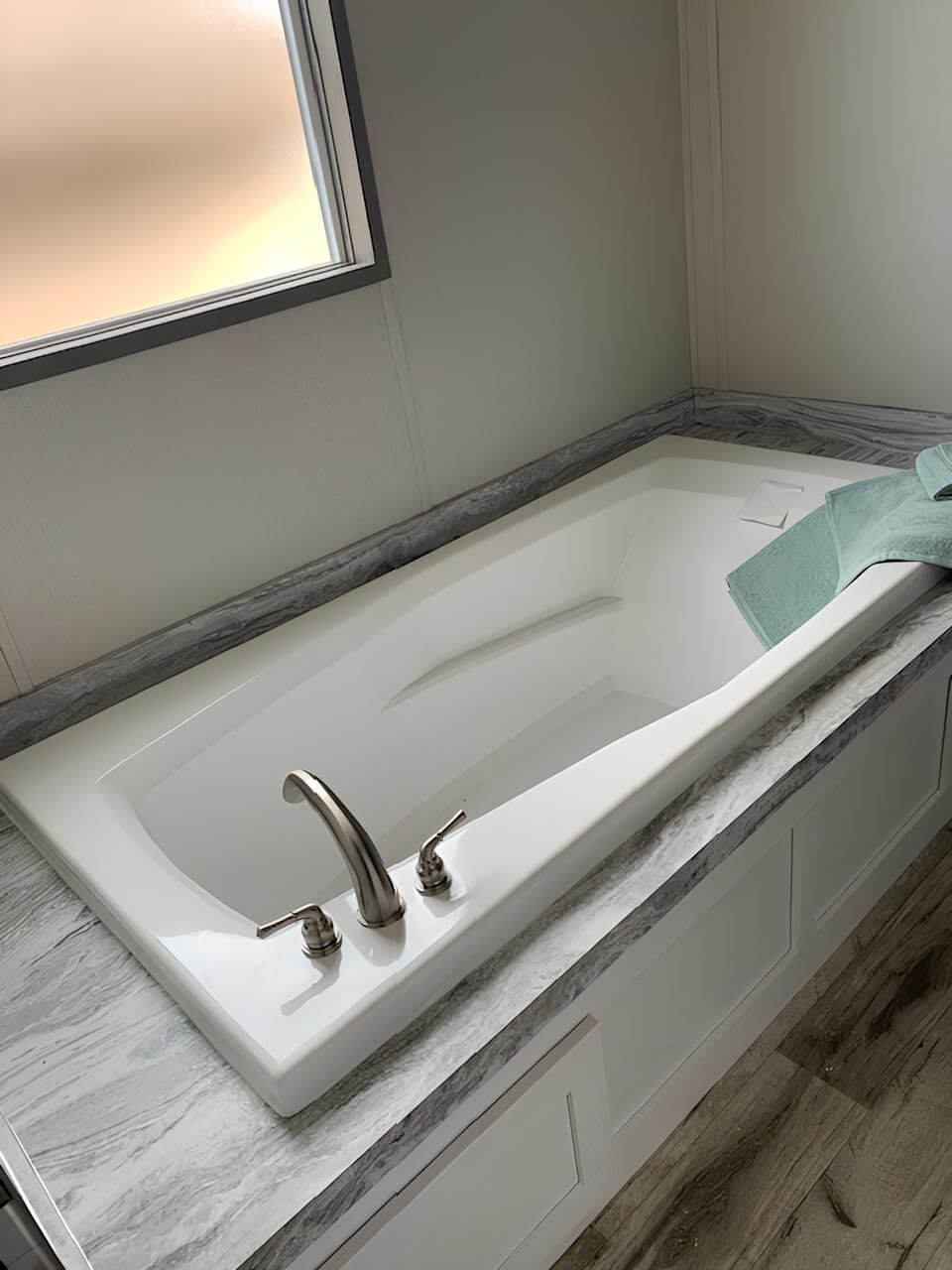 Large soaking tub in the primary bathroom of The Cuatro