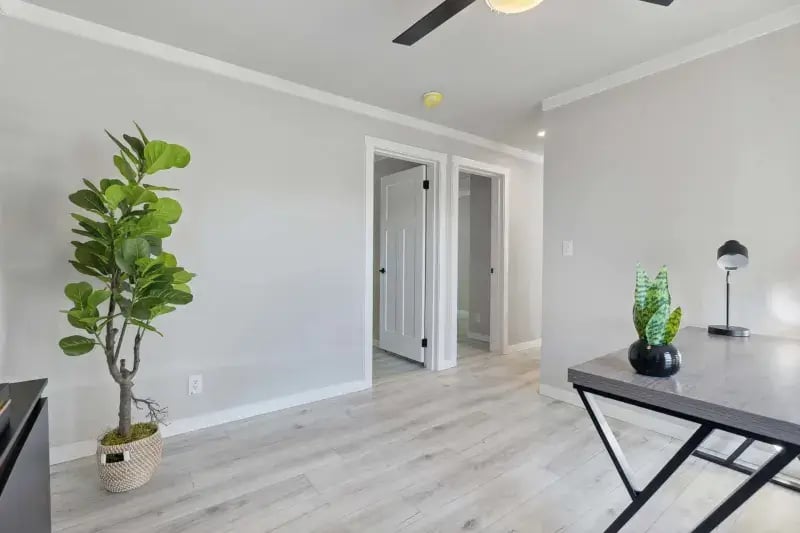 Reverse view of the flex room and hallway in The Carol Champion Homes floor plan