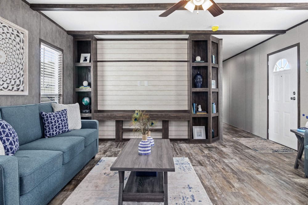 Spacious living area and custom shelving in The Grant by Jessup Housing