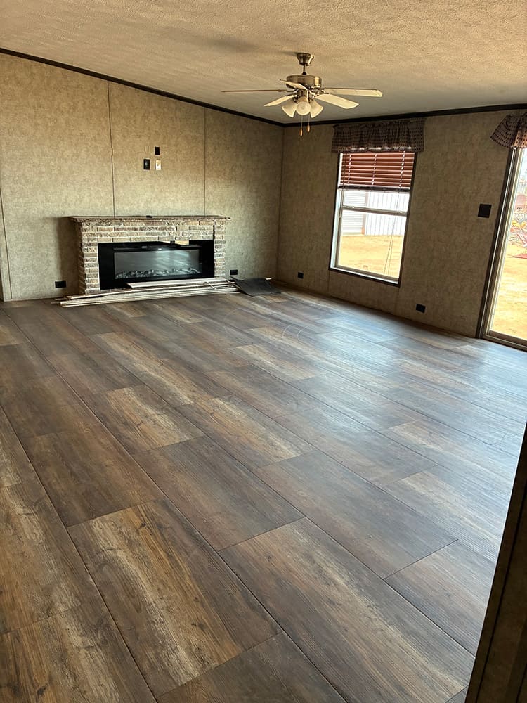 Living room inside huge used doublewide at Bell Mobile Homes in Levelland, TX