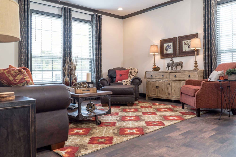 Bright living room in The Nandina mobile home for sale in Cedar Creek
