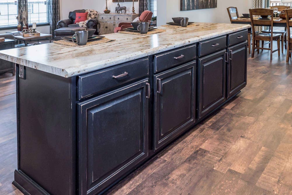 Oversized kitchen island with storage in The Nandina manufactured home