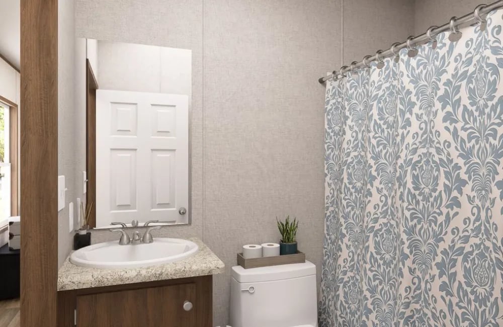 Guest bathroom in The Dogwood single-wide at Factory Mobile Homes Colorado