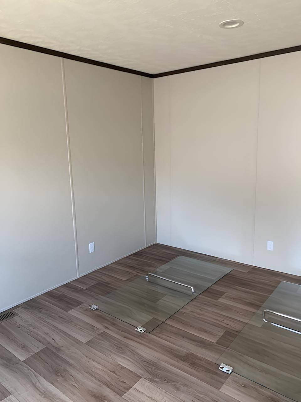Spacious bedroom in The Colossal Ultrawide manufactured home