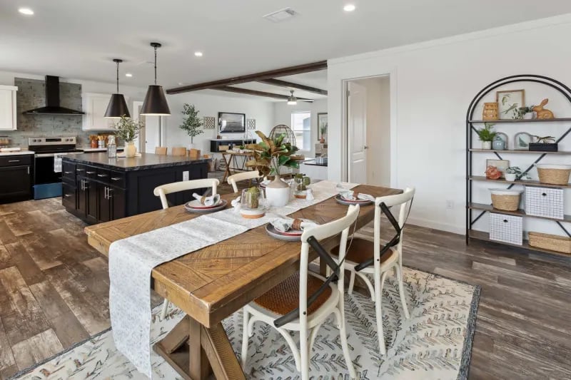 Dining area in the Winter Series 3276H by Champion Homes