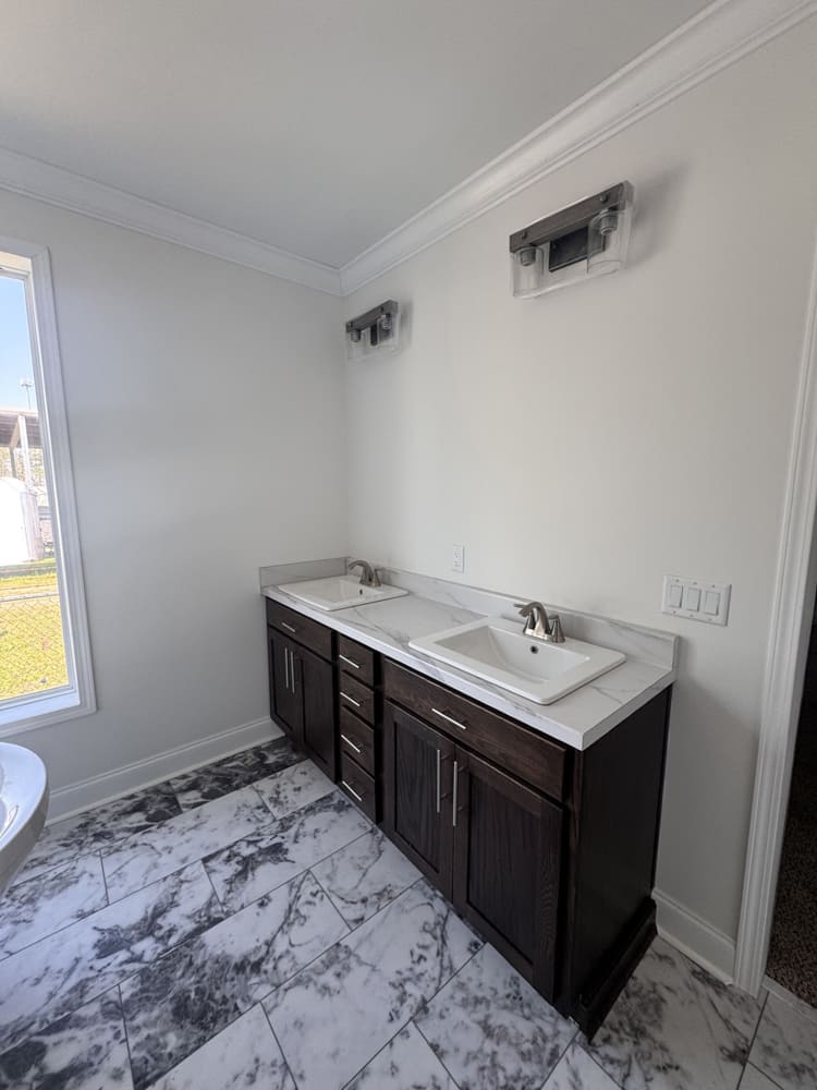 Double-sink bathroom vanity in The Shoreline modular home for sale