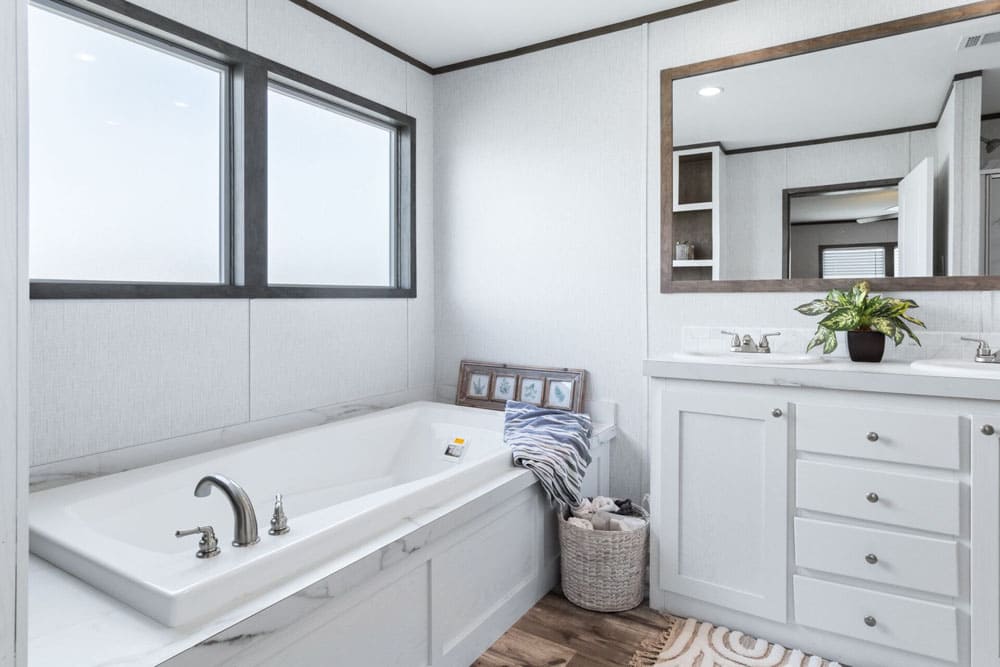 Primary bathroom with soaking tub and double vanity