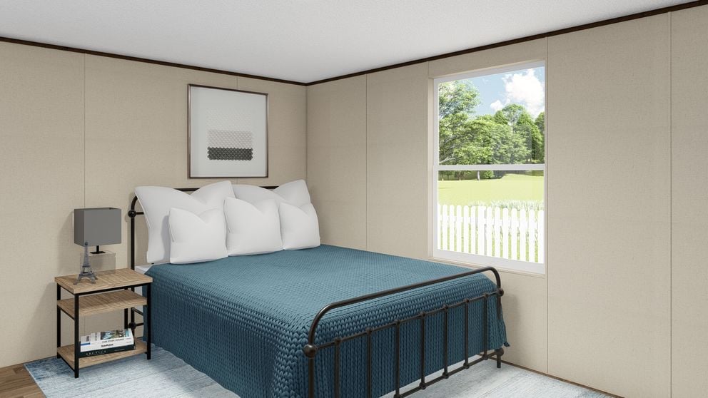 Guest bedroom in The Glory TRS14763BH mobile home