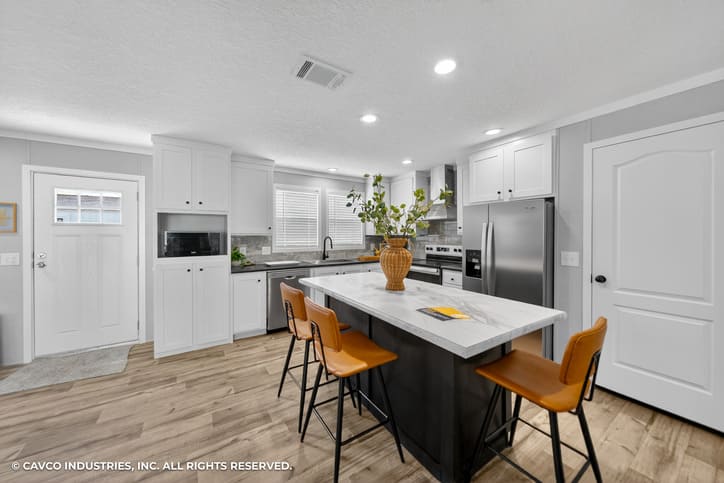 Modern kitchen island with seating in the Cavco Vantage
