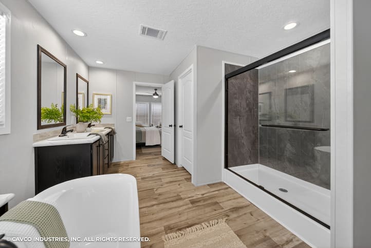 Primary bathroom with soaking tub, double vanity and walk-in shower
