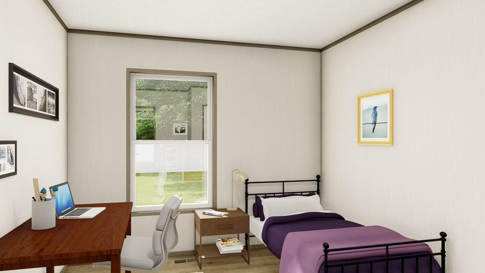 Secondary bedroom in the Clayton Epic Explorer manufactured home for sale in Colorado
