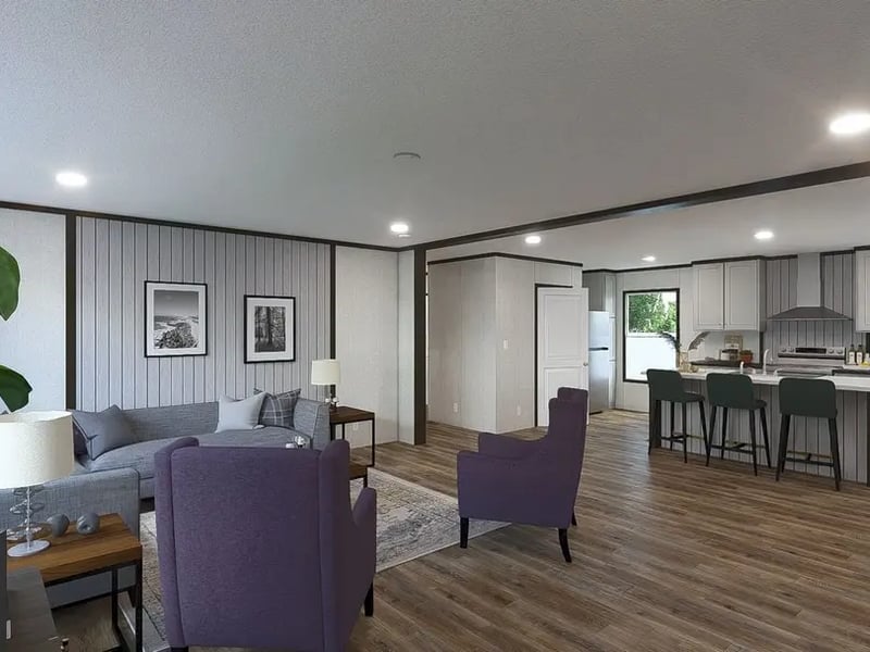 Open living room and kitchen in the Clayton MiYO Empower double-wide