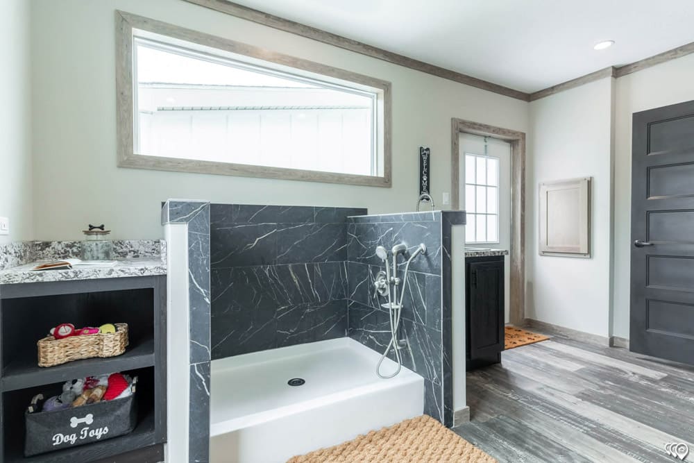 Built-in dog wash and pet storage in The Shoal Creek modular doublewide