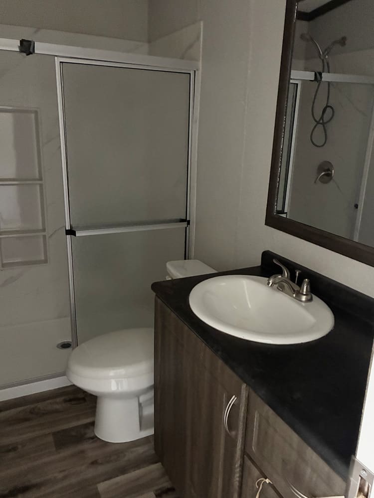 Photo of bathroom in 12x56 Tiny Home - 2 Bedroom #15344 at Bell Mobile Homes in Levelland, TX